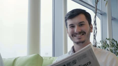 Businessman-reading-newspaper