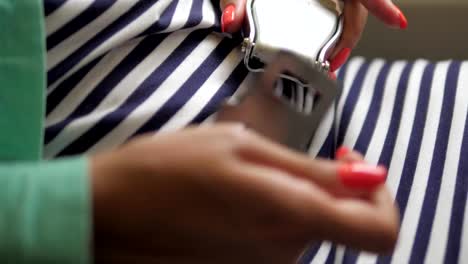 Female-Strap-And-Tighten-The-Seat-Belt-On-The-Plane-Before-The-Flight