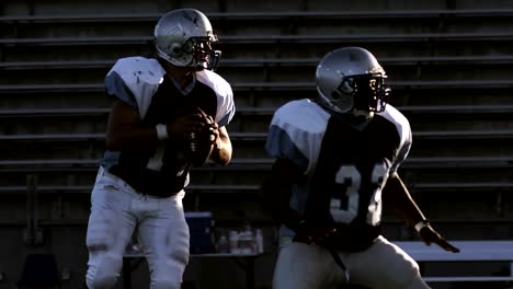 Quarterback-hikes-the-ball-and-then-throws-it-before-getting-tackled