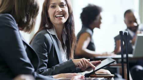 Caucasian-businesswoman-using-wireless-technology-in-airport-lounge