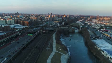 Aerial-of-Harlem,-New-York-City-at-Sunset