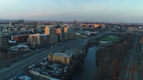 Aerial-of-Harlem,-New-York-City-at-Sunset