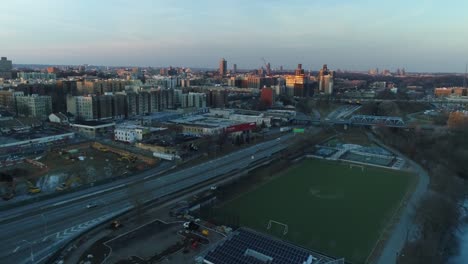 Aerial-of-Harlem,-New-York-City-at-Sunset