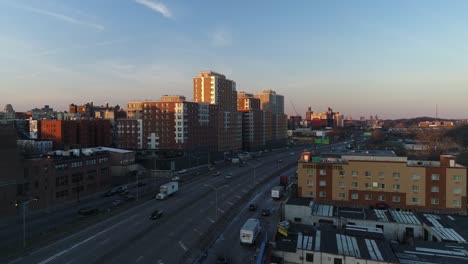 Aerial-of-Harlem,-New-York-City-at-Sunset