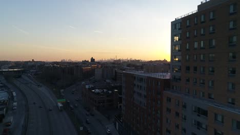 Aerial-of-Harlem,-New-York-City-at-Sunset