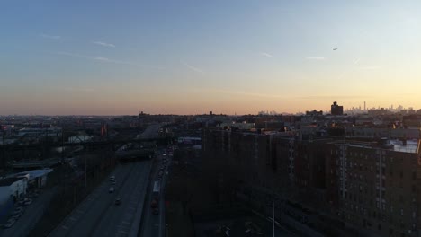 Aerial-of-Harlem,-New-York-City-at-Sunset