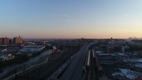 Aerial-of-Harlem,-New-York-City-at-Sunset