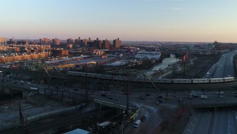 Aerial-of-Harlem,-New-York-City-at-Sunset