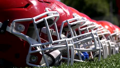 Football-helmet-on-the-grass,-Football