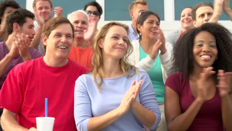 Spectators-Clapping-At-Outdoor-Sports-Event-In-Slow-Motion