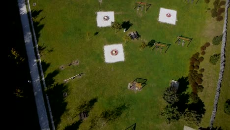 Aerial-shot-of-children's-playground,-basketball-and-football-court