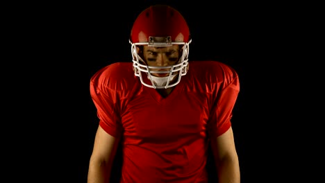 Red-serious-american-football-player-posing