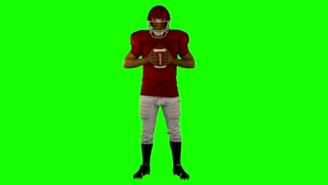 Red-serious-american-football-player-posing