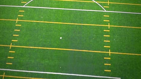 Flying-Over-an-Outdoor-Synthetic-Football-Field