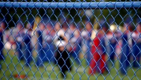 Marching-Band-Behind-Fence