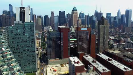 Ascending-Shot-Viewing-Mercedes-House-Of-Luxury-&-The-Empire-State-Building