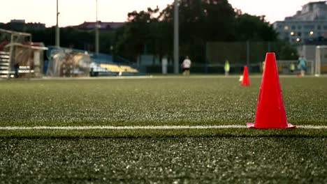 Cone-markers-for-american-football.-Smooth-and-slow-slider-shot.