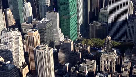 Panoramic-and-aerial-view-of-Manhattan-buildings-in-New-York-City,-NY,-USA.-New-york-city-skyline-aerial-view-at-sunset.-Urban-metropolis-landmark-scenery-background.