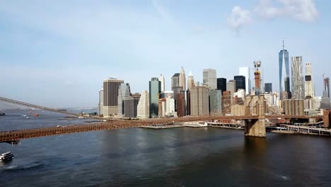 Aerial-view-of-the-New-York,-America.-Scenic-view-of-the-Brooklyn-bridge-through-the-East-river-to-Manhattan