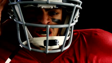 American-football-player-with-a-head-gear-4k