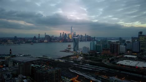 Unique-Aerial-View-of-Downtown-Manhattan-and-Downtown-Jersey-City-at-evening-4K