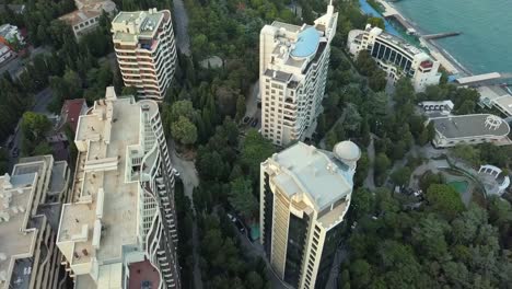 aerial-overhead-top-view-from-above-modern-living-skyscraper-buildings-in-the-eco-settlement