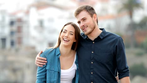 Couple-walking-and-talking-in-a-town