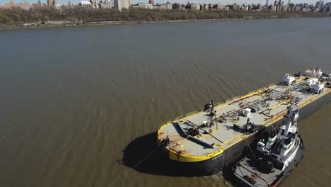 Flyover-Oil-Tanker-Next-To-Tug-Boat-on-Hudson-River