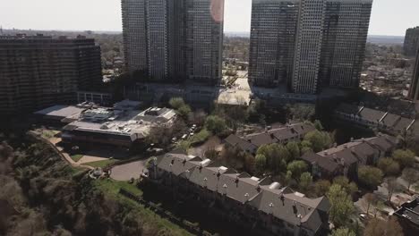 Cliffside-Park-NJ-Flyover-Trees-Towards-Apartment-Complexes