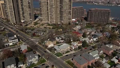 Cliffside-Park-Aerial-Flyover-Of-Intersection-Viewing-High-Rises-&-Hudson-River