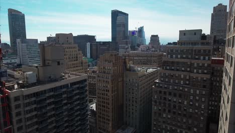 Aerial-Of-NYC-Slow-Fly-Backwards-Between-Buildings