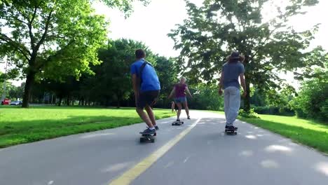 Three-people-having-fun-skateboarding