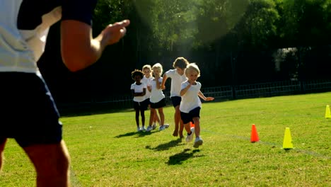 Children-running-in-park-during-race