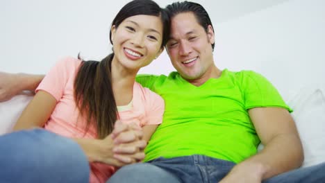 Asian-Chinese-couple-talking-friends-using-video-chat