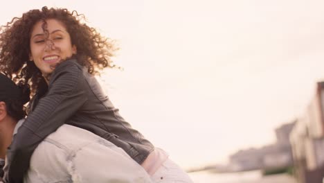 Couple-having-fun-at-the-sunset