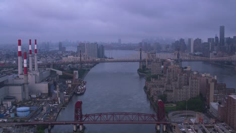 Flying-down-East-River-approaching-Queensboro-Bridge-at-sunrise.