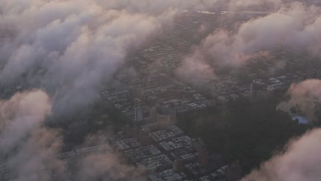 Aerial-view-of-Central-Park-and-Manhattan-through-clouds.