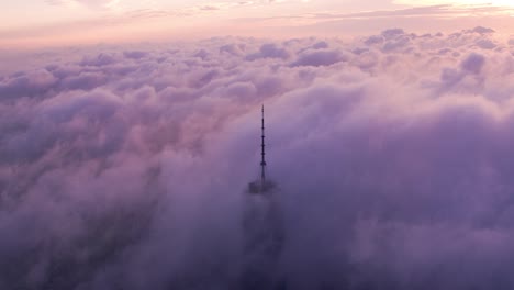 Aerial-view-of-One-World-Trade-Center-building-with-low-clouds-at-sunrise.