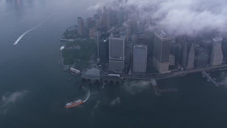 High-angle-aerial-view-of-lower-Manhattan-with-low-clouds.