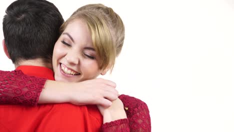 Couple.-Woman-whispering-to-man-ear-hugging-partner-4K