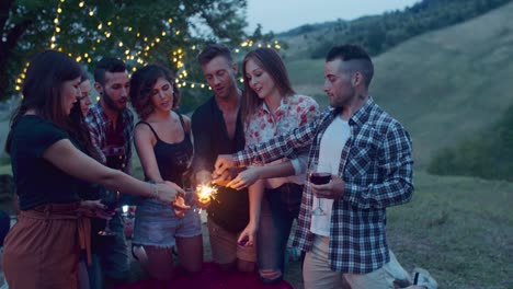 group-of-friends-having-fun-with-sparklers.-shot-in-slow-motion