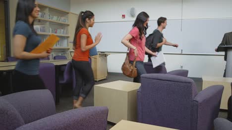 Students-walking-into-a-study-room-together