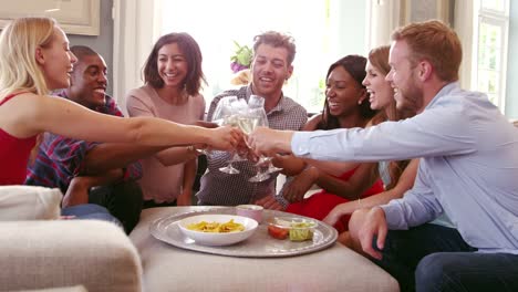 Group-Of-Friends-Celebrating-Together-At-Home-Shot-On-R3D