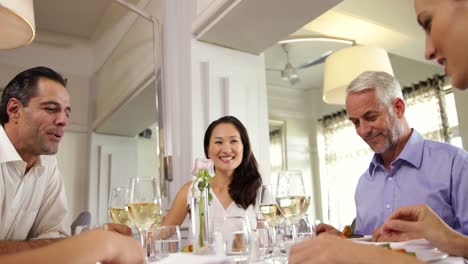 Group-of-friends-having-a-meal-together