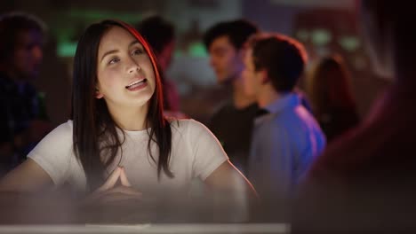 Woman-ordering-drink-at-bar