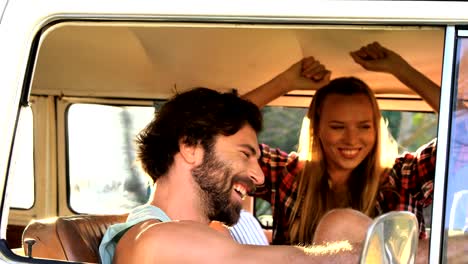 Hipster-couple-dancing-in-the-van