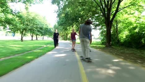Three-people-having-fun-skateboarding