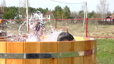 Two-brothers-having-fun-with-splashes