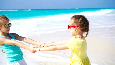 Little-happy-kids-having-fun-together-on-the-beach