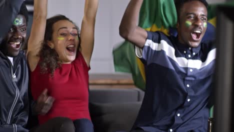 Brazil-Guys-Watching-TV-Match-and-Supporting-Team